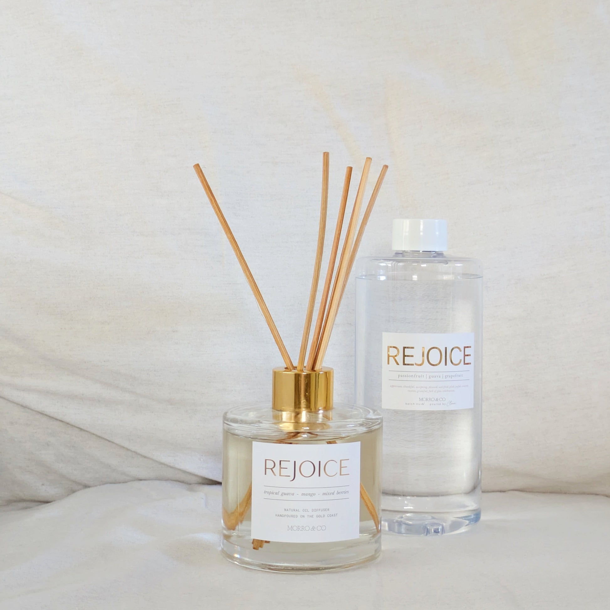 Rejoice eco reed diffuser and bottle on a white surface