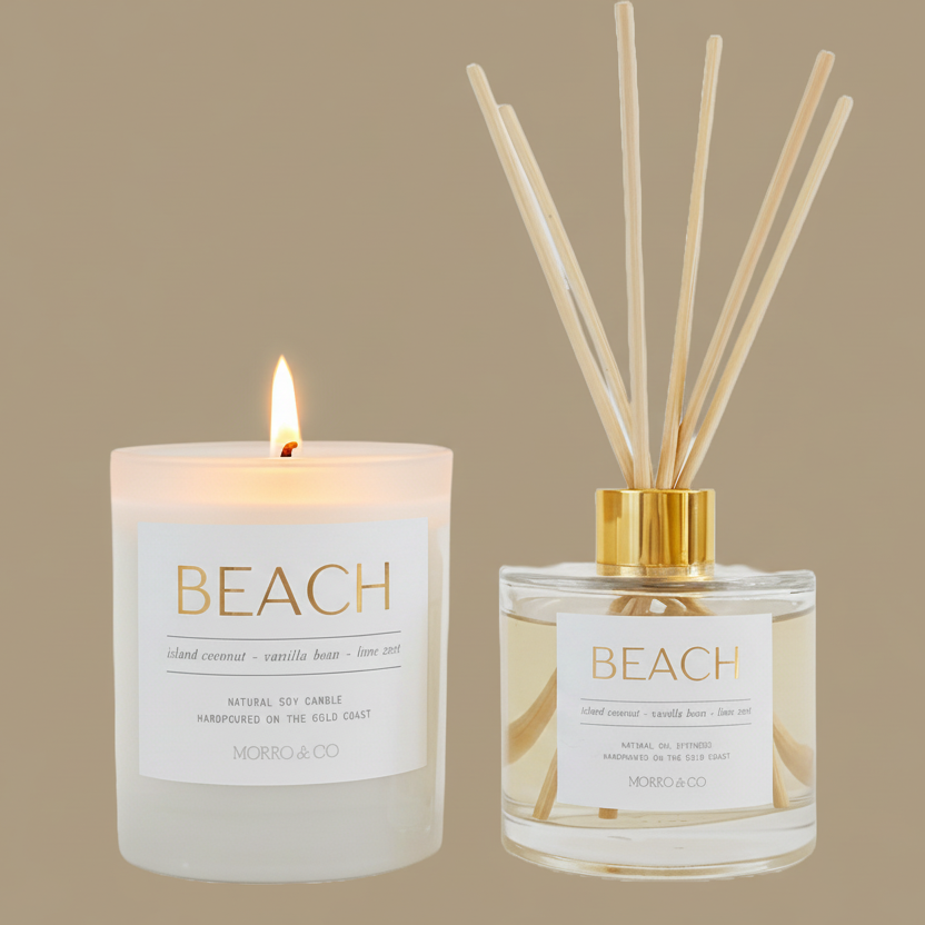 Candle and diffuser set labeled 'Beach' on a beige background