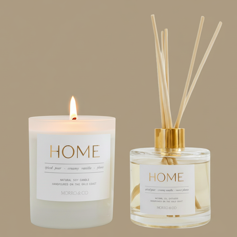 Candle and diffuser set with 'HOME' labels on a beige background