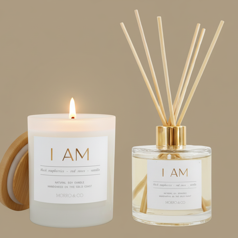 Candle and diffuser set with 'I AM' branding on a beige background
