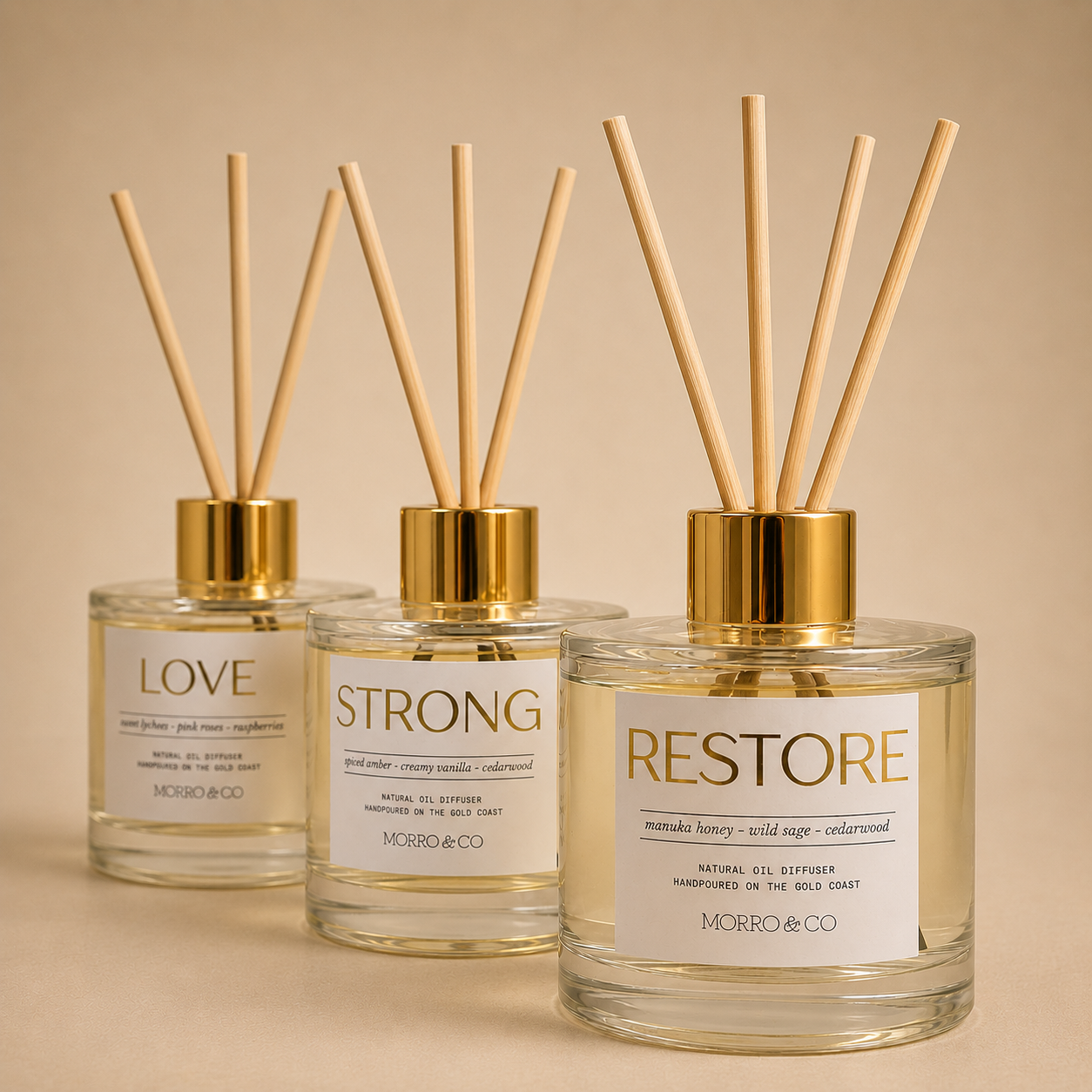 Morro & Co eco reed (3) diffusers labeled 'Love', 'Strong', and 'Restore' on a beige background