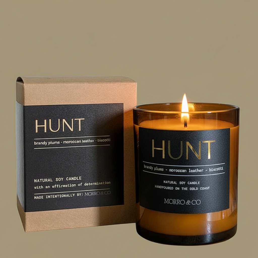Hunt candle with packaging on a beige background