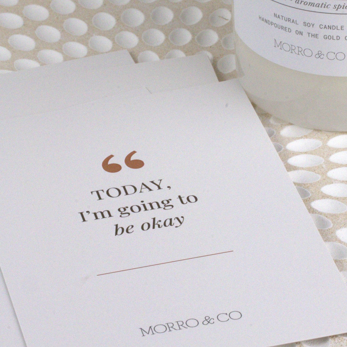 Morro & Co women's affirmation card beside a natural soy candle, featuring the words “Today, I'm going to be okay.”