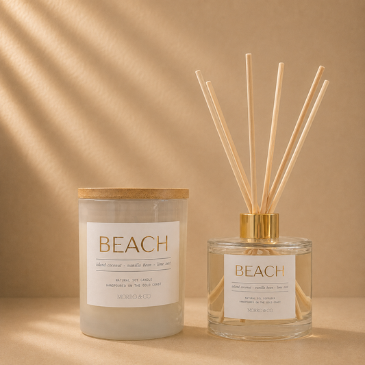 Morro & Co BEACH natural soy candle and eco reed diffuser on a warm beige background
