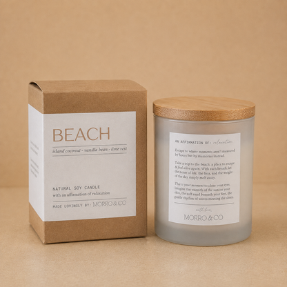 Morro & Co BEACH natural soy candle with packaging on a warm beige background