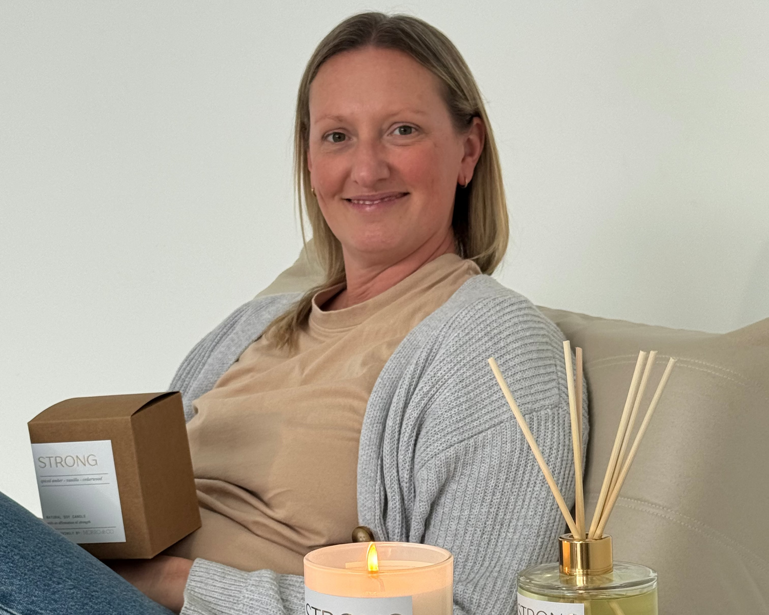 Morro & Co STRONG candle and eco reed diffuser styled in a home